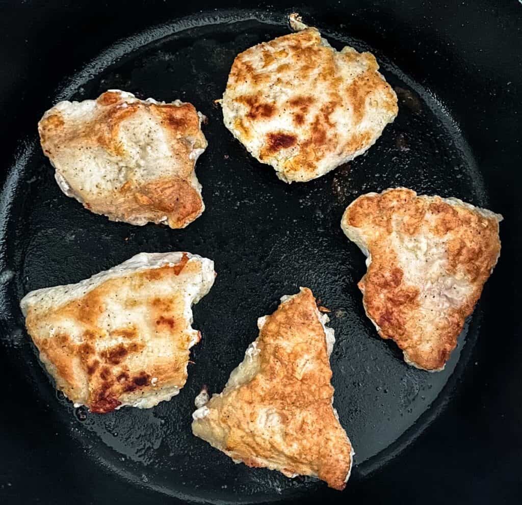 cooked chicken in skillet