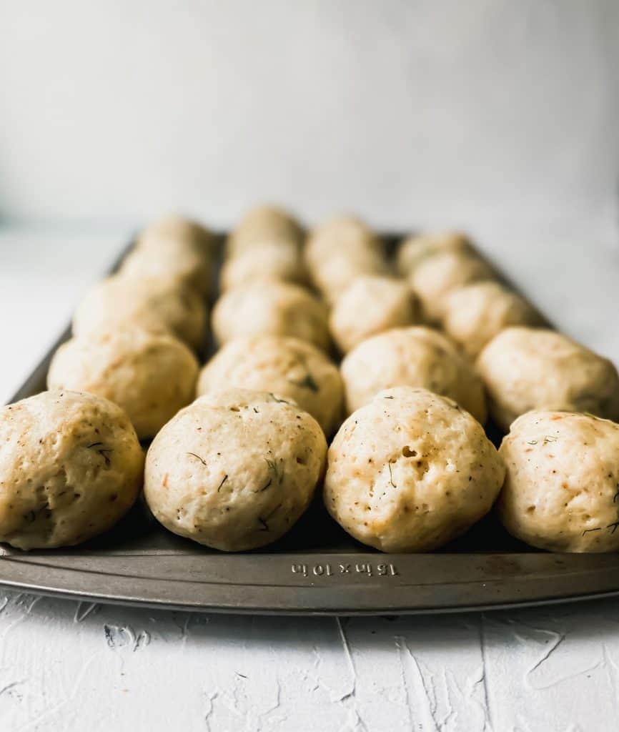 cooked matzo balls on a sheet pan